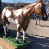 brown white painted horse front view aluminum statue